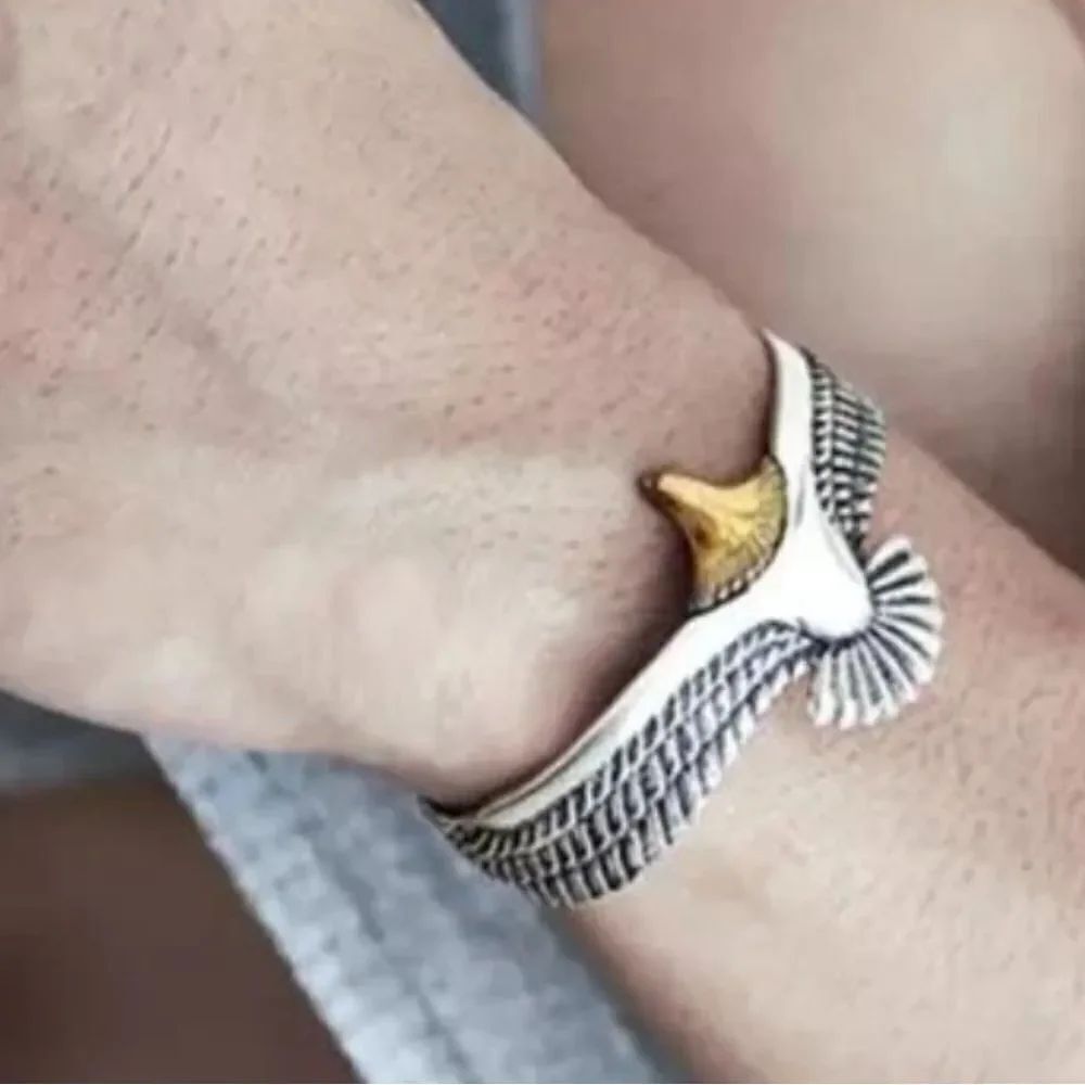 Elegant Silver and Gold Winged Bracelet